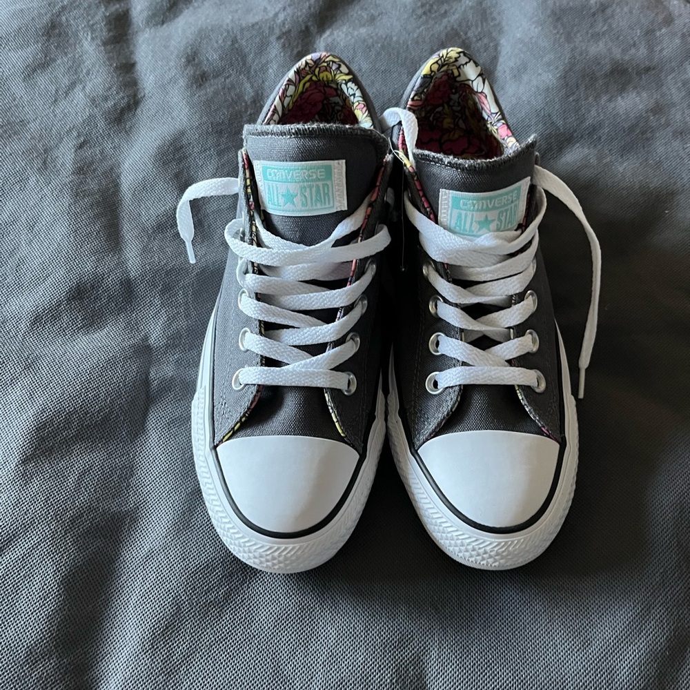 New With Tags Size 7  Converse All Stars. Gray with floral lining.